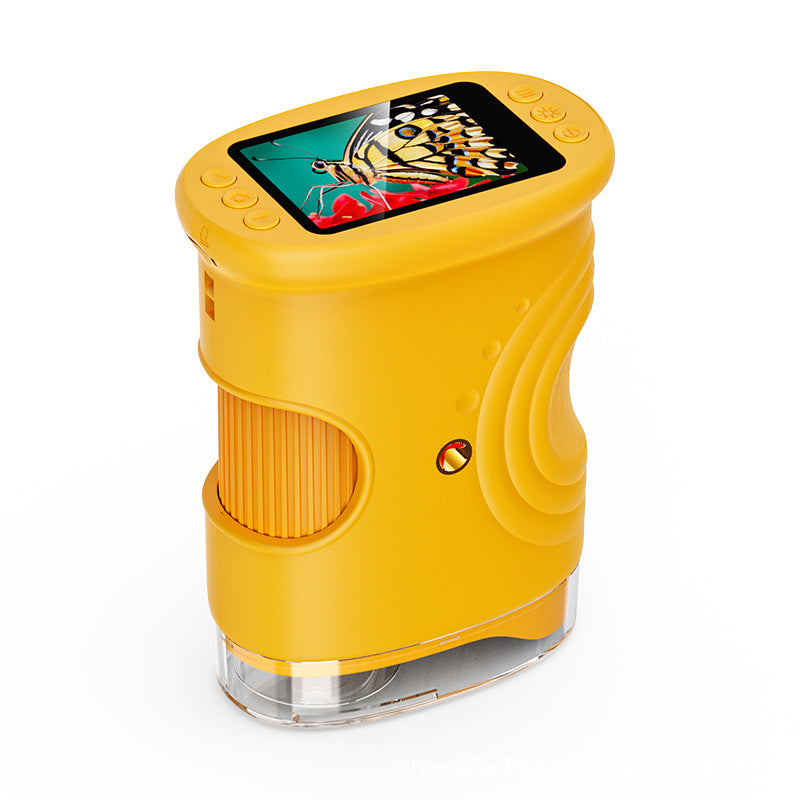 Child holding a digital camera