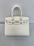 Outer sewn commuter single-shoulder handbag