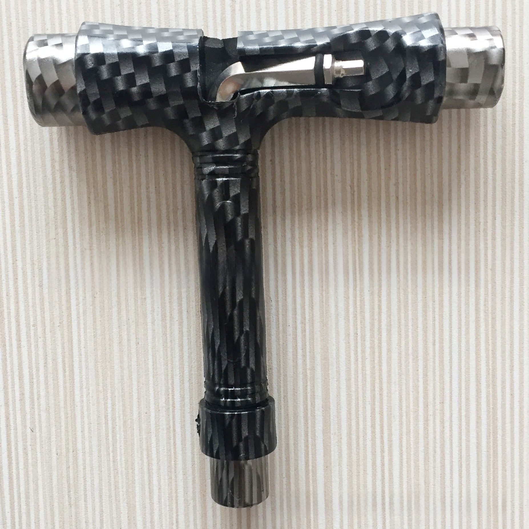 Multi-functional skateboard T-shaped tool