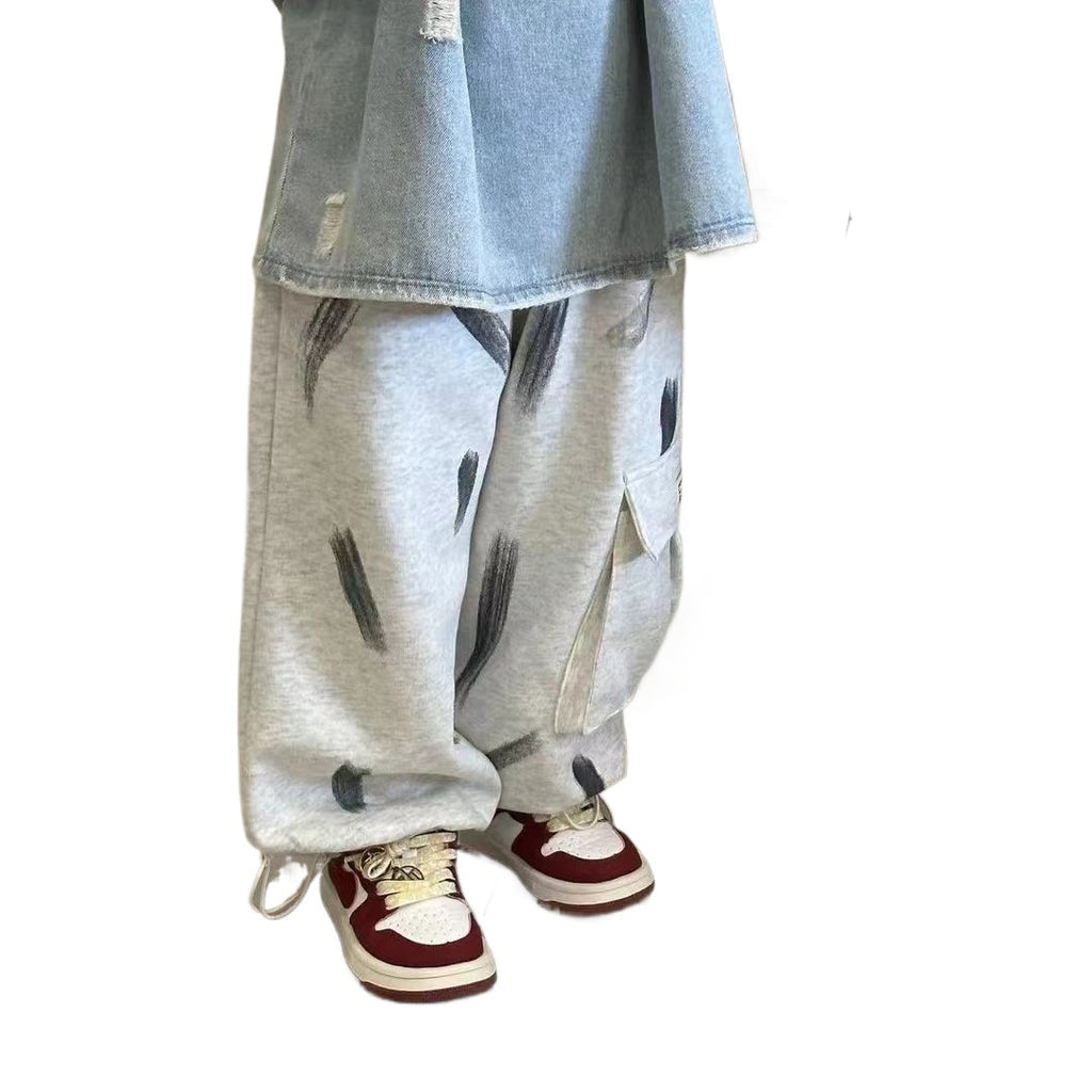 Children's denim short-sleeve top with distinctive ripped design